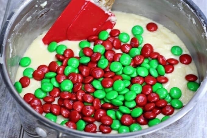 Tis the season for some sweet treats. This festive 3-Ingredient Holiday Fudge only takes a few ingredients and a few minutes to make and is so delicious! #FudgeRecipe #Fudge #Candy #ChristmasCookies #HolidayFudge #ChristmasRecipe #CandyRecipe #Christmascookieexchange #Christmascookierecipe #ChristmasCookies