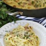 Eggs, bacon and parmesan team up to create an out of this world Pasta Carbonara. This easy recipe is perfect for a quick weeknight meal. #PastaCarbonara #PastaRecipe #EasyRecipe #Spaghetti