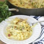 Eggs, bacon and parmesan team up to create an out of this world Pasta Carbonara. This easy recipe is perfect for a quick weeknight meal.
