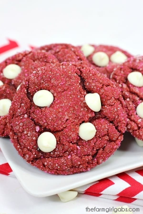 Share some love this Valentine's Day with these 4-ingredient Red Velvet Cake Mix Cookies. This cookie recipe is so chewy and delicious. #cookies #cakemixcookie #redvelvet #redvelvetcookies