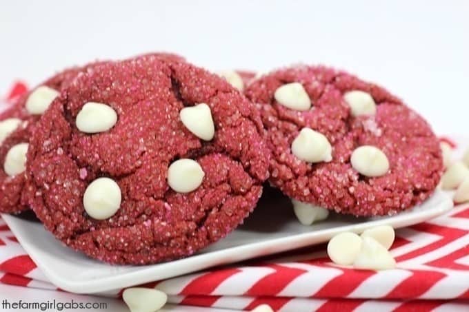 Share some love this Valentine's Day with these 4-ingredient Red Velvet Cake Mix Cookies. This cookie recipe is so chewy and delicious. #cookies #cakemixcookie #redvelvet #redvelvetcookies