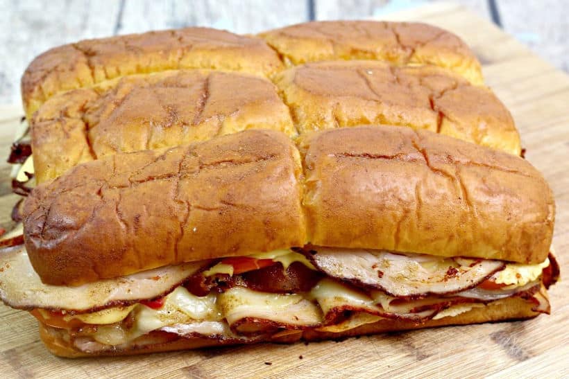 You don't have to go to the famous Brown Hotel to enjoy these Kentucky Hot Brown Sliders. These drool-worthy sandwiches are a delicious homemade version of the yummy Hot Brown. #hotbrown #sliders #kentuckyhotbrown #sandwich