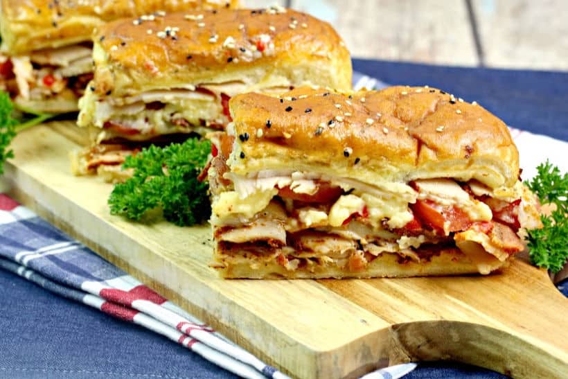 You don't have to go to the famous Brown Hotel to enjoy these Kentucky Hot Brown Sliders. These drool-worthy sandwiches are a delicious homemade version of the yummy Hot Brown. #hotbrown #sliders #kentuckyhotbrown #sandwich