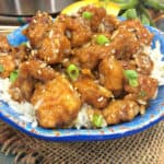 Ready in 20 minutes, this Instant Pot Orange Chicken recipe is a delicious option to ordering Chinese take-out. Raise your hand if you love Instant Pot recipes! #InstantPot #OrangeChicken #InstantPotRecipe #EasyMeal #ChineseFood