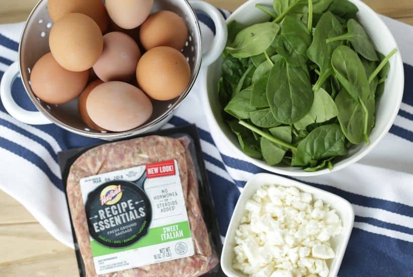 Start your day off right with this Sausage, Spinach and Feta Frittata recipe. This easy frittata recipe is perfect for breakfast or brunch. This make-ahead breakfast option is perfect throughout the week for a quick meal or snack. #frittata #sausagefrittata