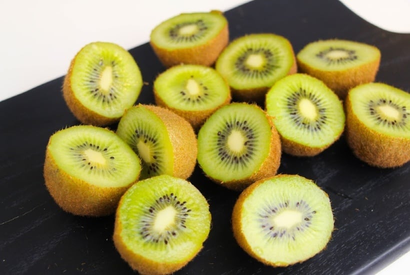This easy Kiwi Fruit Salad With Honey Citrus Dressing recipe is perfect to enjoy any time of the year. The optional honey citrus dressing adds the perfect amount of sweetness. #fruitsalad #kiwi #mandarinorange #dessert #healthyrecipe