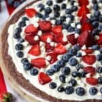 This red, white and blue Star-Spangled Brownie Pizza is perfect for any 4th of Juoly or patriotic celebration. Bring this easy patriotic recipe to your July 4th picnic. Also be sure to check out these best 4th of July dessert recipes for your party. These summer dessert recipes are delicious!