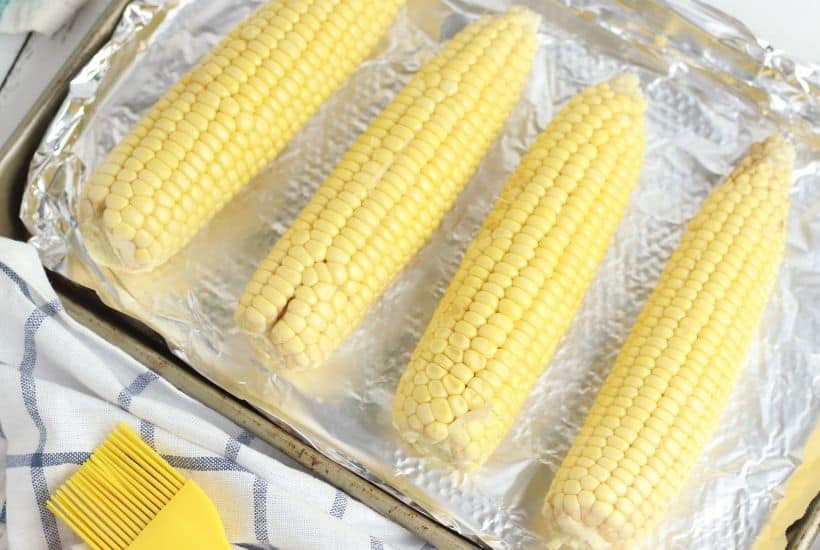 Summer calls for corn on the cob. Spice up your corn with this tasty Cajun roasted corn recipe. This easy corn ecipe is perfect for any summer BBQ. #Corn #CornRecipe #SummerRecipe #BBQ