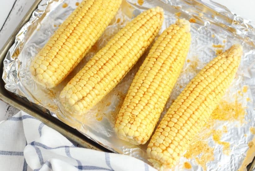Summer calls for corn on the cob. Spice up your corn with this tasty Cajun roasted corn recipe. This easy corn ecipe is perfect for any summer BBQ. #Corn #CornRecipe #SummerRecipe #BBQ