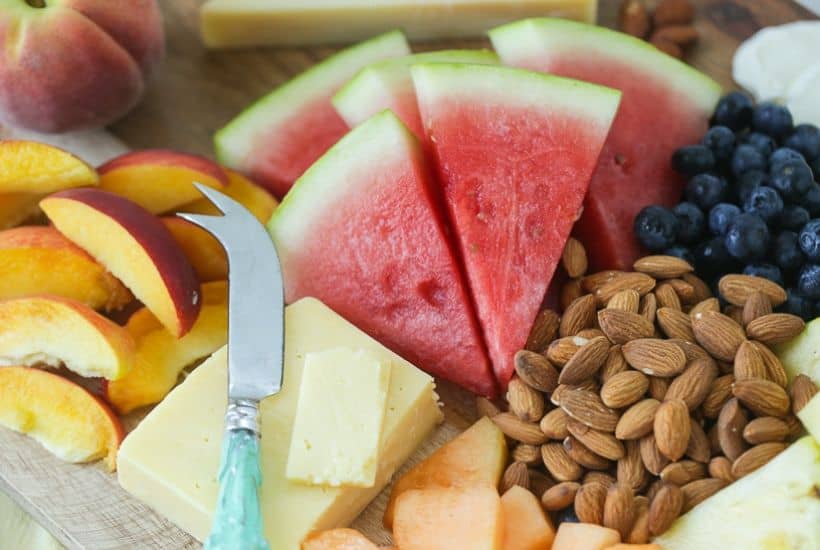 Take summer entertaining to the next level with this easy Summer Fruit And Cheese Board. This fruit and cheese board is an easy party recipe.
