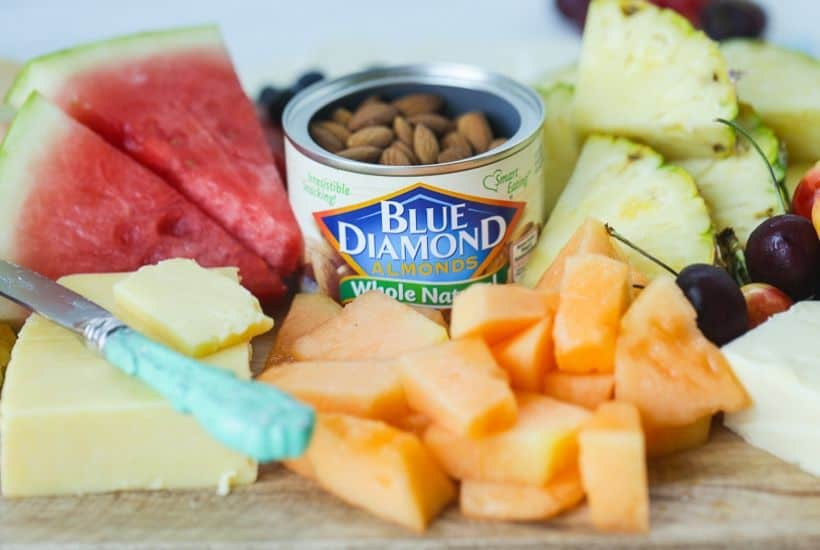 Take summer entertaining to the next level with this easy Summer Fruit And Cheese Board. This fruit and cheese board is an easy party recipe.