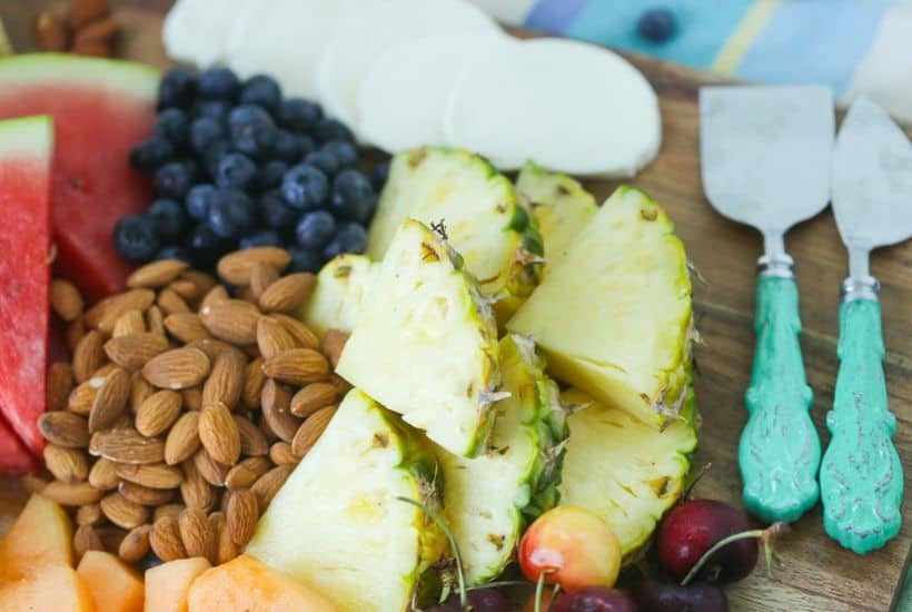 Take summer entertaining to the next level with this easy Summer Fruit And Cheese Board. This fruit and cheese board is an easy party recipe.