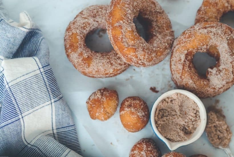 When donuts are light golden, turn with wooden spoon and repeat on flip side. *The darker the donut, the tougher the texture.