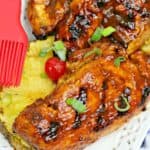 This flavorful Grilled Huli Huli Chicken recipe is delicious and simple. This Hawaiian-inspired chicken recipe is marinated and grilled to perfection. #grilledchicken #hulihulichicken #grillingrecipe #hawaiianchicken