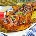 This flavorful Grilled Huli Huli Chicken recipe is delicious and simple. This Hawaiian-inspired chicken recipe is marinated and grilled to perfection.