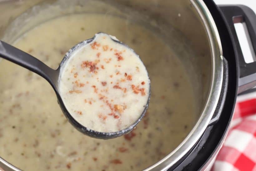 Warm up with a comforting bowl of this tasty Instant Pot Cheeseburger Soup. This hearty Instant Pot soup recipe is made from scratch and ready in no time. #instantpotrecipe #soup #cheeseburgersoup
