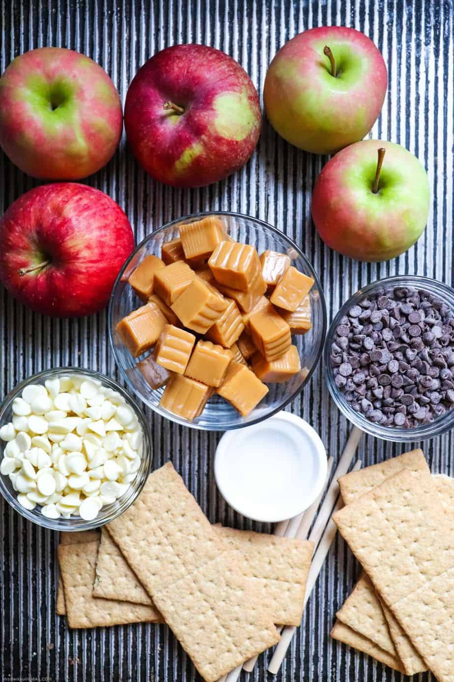 Nothing says fall like crisp apples. Add a sweet twist to your apples with this easy and delicious Homemade Caramel Apples recipe. This is a fun fall apple dessert to decorate and eat! These yummy apple snacks will be a hit, #applerecipe #caramelapples #candyapples #falldessert