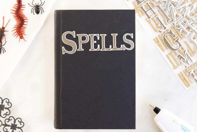 Cast a spell on your friends and family this Halloween. Create your own Halloween Spell Book with this easy craft tutorial. This Halloween craft is spellbinding! #halloweencraft #hocuspocus #halloweendecor