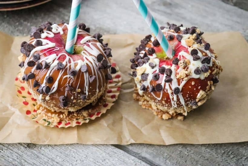Nothing says fall like crisp apples. Add a sweet twist to your apples with this easy and delicious Homemade Caramel Apples recipe. This is a fun fall apple dessert to decorate and eat! These yummy apple snacks will be a hit, #applerecipe #caramelapples #candyapples #falldessert