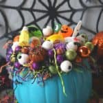 This DIY Teal Pumpkin Treat Holder is all treats and no tricks. Trick or Treaters will love this teal pumpkin filled with non-candy treats.