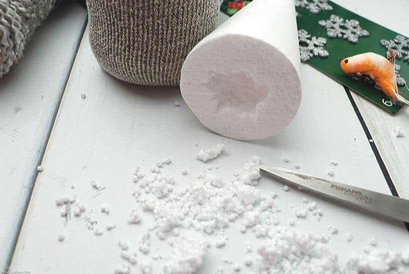 Gnomes are so popular right now. Celebrate the season with this DIY Buffalo Check Christmas Gnome is a fun Christmas craft you can make yourself. #Gnome #ChristmasGnome #ChristmasCraft