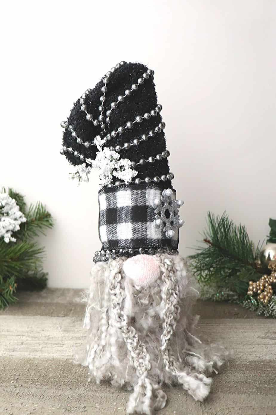 Gnomes are so popular right now. Celebrate the season with this DIY Buffalo Check Christmas Gnome is a fun Christmas craft you can make yourself.