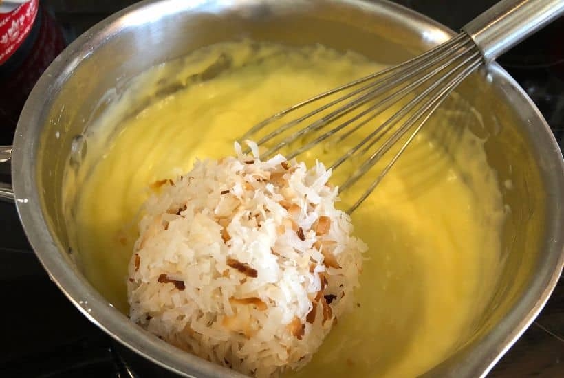 You can't go wrong with a slice of this luscious Coconut Cream Pie. This Best Coconut Custard pie recipe has a creamy coconut custard filling and topped with sweet whipped cream. All of this is nestled into a buttery, flaky pie crust. This easy pie recipe is perfect to serve all year long. #coconutcustardpie #pierecipe #easypierecipe #nobakedessert