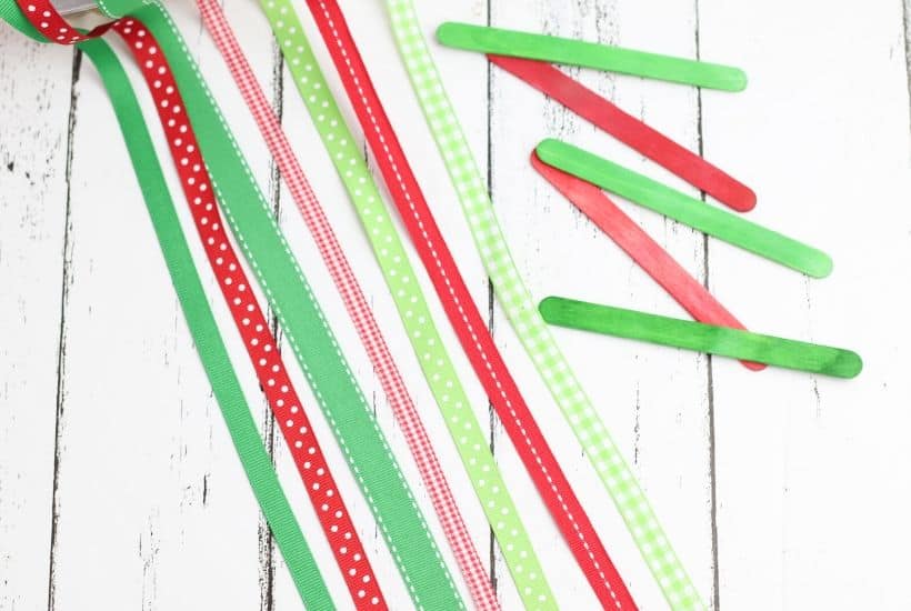 These Ribbon Tree Ornaments are a fun Christmas craft to make. Use any colorful ribbon to make these easy ornaments for your Christmas tree. This is a fun Christmas craft for kids too. #ornaments #ChristmasTree #ChristmasCraft
