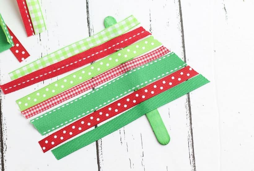 These Ribbon Tree Ornaments are a fun Christmas craft to make. Use any colorful ribbon to make these easy ornaments for your Christmas tree. This is a fun Christmas craft for kids too. #ornaments #ChristmasTree #ChristmasCraft