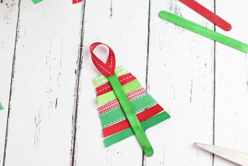 These Ribbon Tree Ornaments are a fun Christmas craft to make. Use any colorful ribbon to make these easy ornaments for your Christmas tree. This is a fun Christmas craft for kids too. #ornaments #ChristmasTree #ChristmasCraft