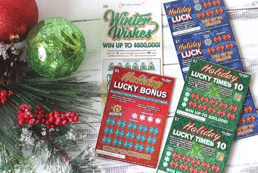 Ring in the holiday season with this easy gift idea. Share some luck this holiday season by giving this DIY New Jersey Lottery Scratch Off Ticket Christmas Arrangement. This is an easy DIY Christmas craft. #ad #BestGifts, #TheGiftThatKeepsOnGiving #NewJerseyLottery #NJLotteryHoliday