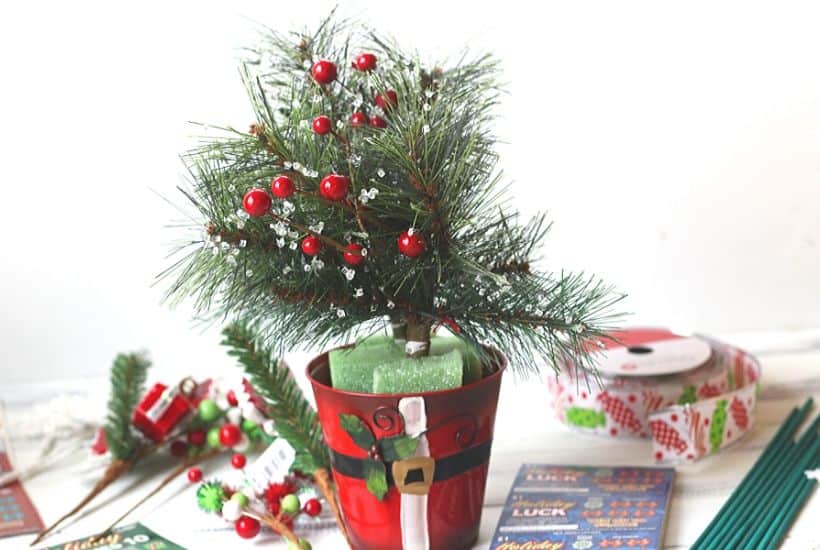 Ring in the holiday season with this easy gift idea. Share some luck this holiday season by giving this DIY New Jersey Lottery Scratch Off Ticket Christmas Arrangement. This is an easy DIY Christmas craft. #ad #BestGifts, #TheGiftThatKeepsOnGiving #NewJerseyLottery #NJLotteryHoliday