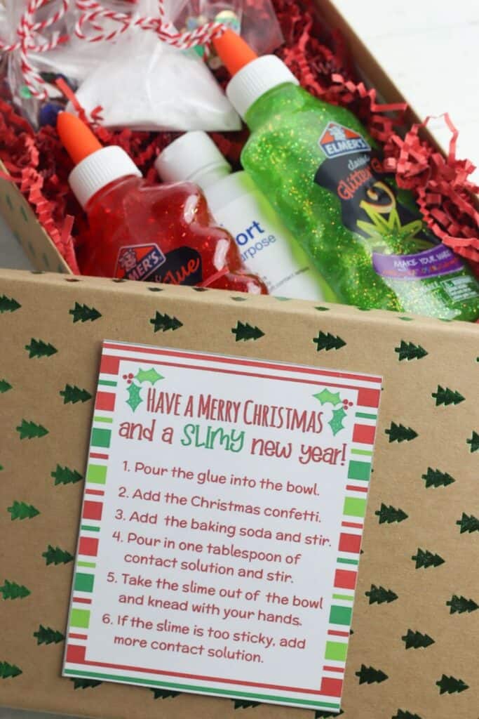 Kids will love receiving this easy Christmas Slime In A Box Gift Idea. This fun DIY Christmas gift takes minutes to put together.