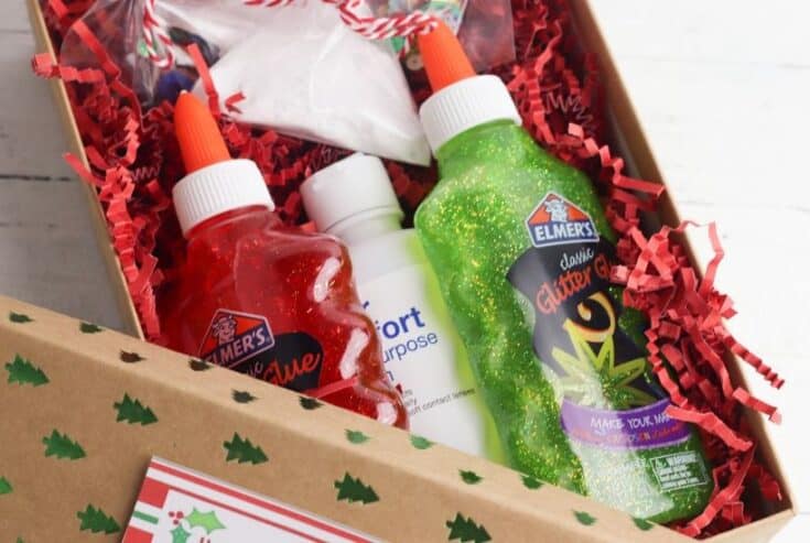 Kids will love receiving this easy Christmas Slime In A Box Gift Idea. This fun DIY Christmas gift takes minutes to put together. 
