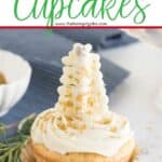 Satisfy your yuletide sweet tooth with these elegant Christmas Tree Cupcakes. This easy Christmas dessert recipe is perfect for your holiday spread. White Chocolate and pretzel sticks make the pretty glittering Christmas tree topper. #christmascupcake #cupcakerecipe #dessert