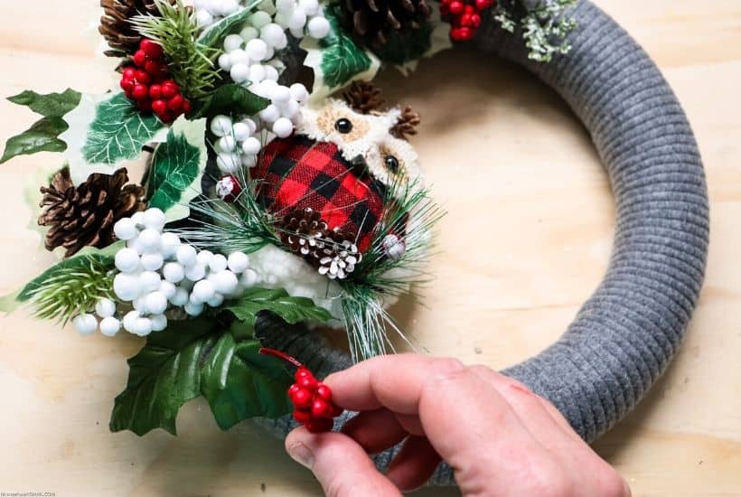 Add a rustic farmhouse touch to your Christmas decor this year. This whimsical DIY Woodland Owl Christmas Wreath is an easy Christmas craft project. #christmaswreath #christmascraft