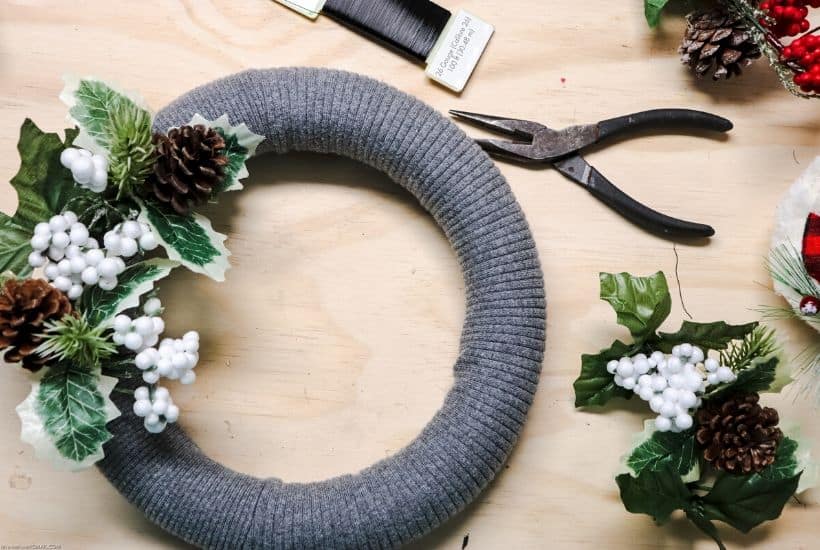 Add a rustic farmhouse touch to your Christmas decor this year. This whimsical DIY Woodland Owl Christmas Wreath is an easy Christmas craft project. #christmaswreath #christmascraft