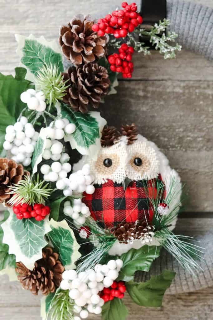 Add a rustic farmhouse touch to your Christmas decor this year. This whimsical DIY Woodland Owl Christmas Wreath is an easy Christmas craft project. #christmaswreath #christmascraft