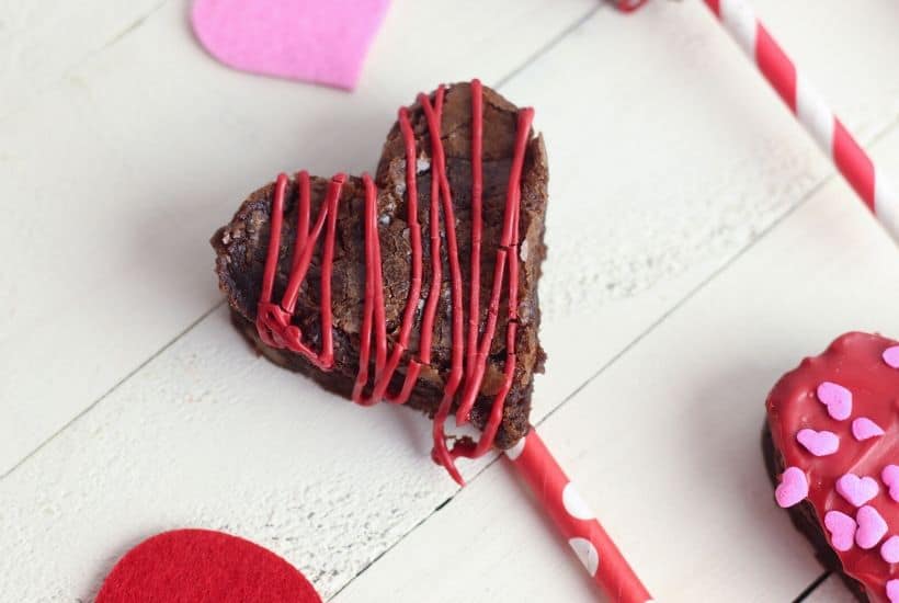 These heart-shaped Valentine Brownie Pops are an easy holiday treat. They are an easy chocolate dessert to make for Valentine's Day or all year long.