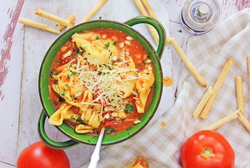 Warm yourself up with a bowl of this Instant Pot Chicken Parmesan Soup. This easy instant pot soup is a delicious comfort food recipe.
