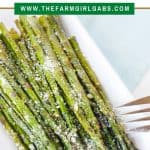 Roasted Asparagus with Garlic and Parmesan is a quick and delicious vegetable recipe. You can’t go wrong with fresh asparagus, garlic and parmesan! This easy asparagus is an easy side dish for a family dinner or special occasion holiday. If you like asparagus, you will love how delicious this roasted asparagus recipe is. #asparagusrecipe #easysidedish #vegetablerecipe