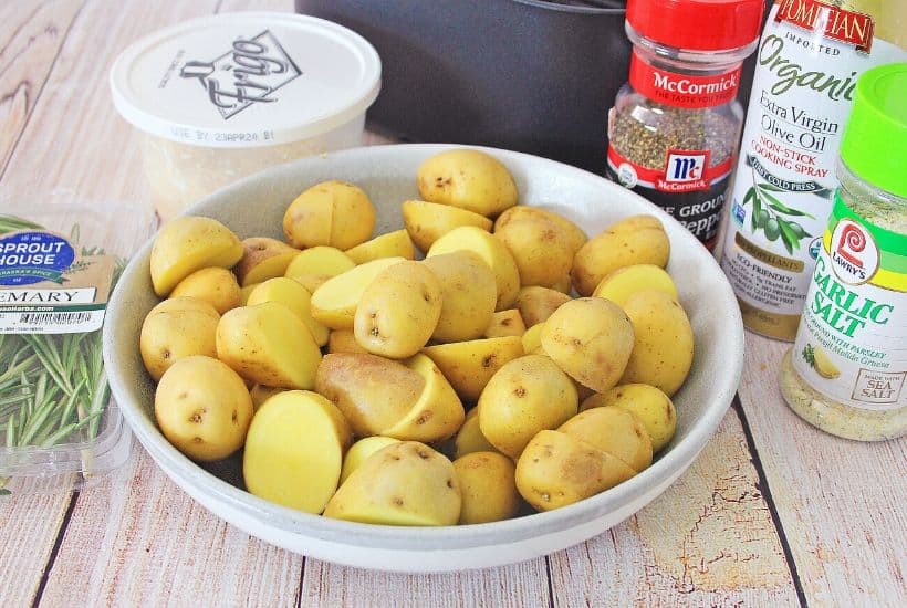 Lighten up your side dish routine with this easy Air Fryer Parmesan Rosemary Potatoes. This is a delicious weeknight or holiday side dish. We all love potato recipes and this potato recipe is quick and easy. This air fryer recipe is a healthier version of the classic roasted potatoes. Your family will love this healthy air fryer potato recipe. #potatorecipe #airfryerrecipe #airfryer #healthyrecipe
