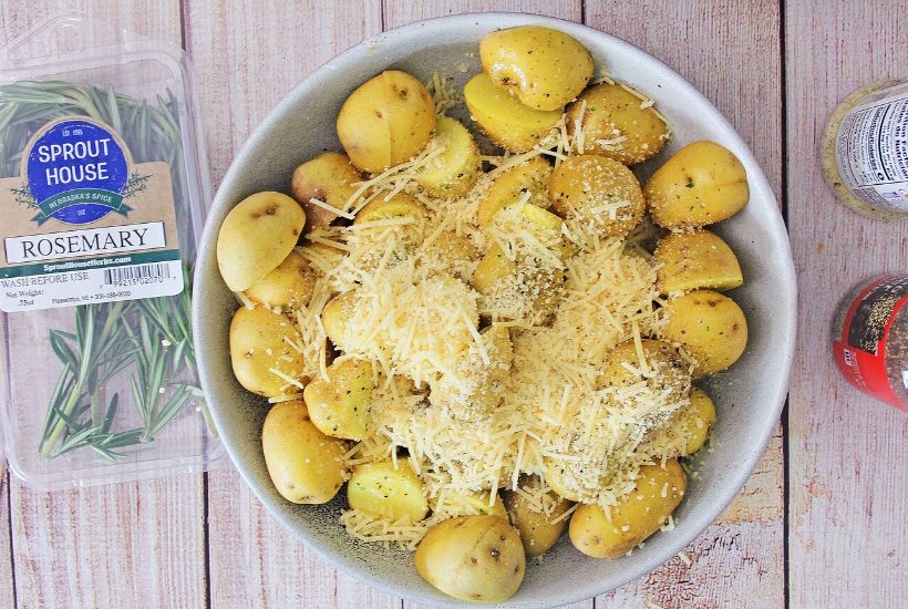 Lighten up your side dish routine with this easy Air Fryer Parmesan Rosemary Potatoes. This is a delicious weeknight or holiday side dish. We all love potato recipes and this potato recipe is quick and easy. This air fryer recipe is a healthier version of the classic roasted potatoes. Your family will love this healthy air fryer potato recipe. #potatorecipe #airfryerrecipe #airfryer #healthyrecipe