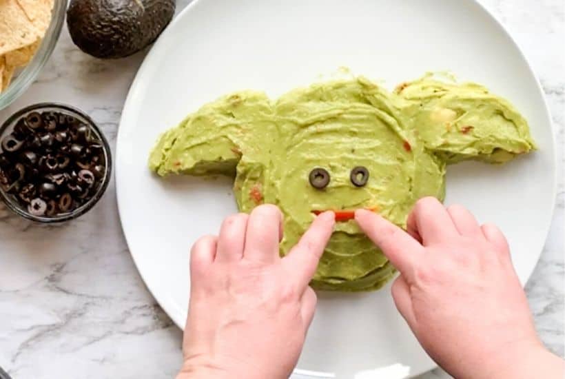 Whether it's Cinco de Mayo or Star Wars day, this Baby Yoda Guacamole Platter is the fun entertaining recipe that Star Wars fans will think is out of this world.