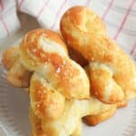 Craving a salty snack? Whip up a batch of these Easy Homemade Soft Pretzel Twists. This easy snack recipe won't last long. This basic pretzel dough recipe can be shaped into twists, knots, bites or the classic pretzel shape.