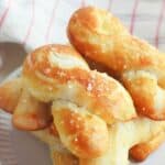 Craving a salty snack? Whip up a batch of these Easy Homemade Soft Pretzel Twists. This easy snack recipe won't last long. This basic pretzel dough recipe can be shaped into twists, knots, bites or the classic pretzel shape.