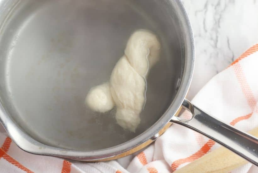 Craving a salty snack? Whip up a batch of these Easy Homemade Soft Pretzel Twists. This easy snack recipe won't last long. This basic pretzel dough recipe can be shaped into twists, knots, bites or the classic pretzel shape.