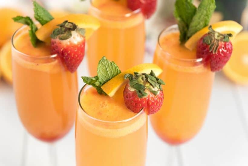 Mimosa Cocktails aren't just for brunch. These Farm Fresh Strawberry Mimosas are great to serve for any party or occasion. This easy cocktail is perfect when strawberries are at their peak.