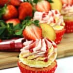 A Strawberry cupcake, fresh strawberries and a delicious cheesecake filling pair to make these delicious Strawberry Cheesecake Cupcakes. This strawberry cheesecake cupcake recipe is a real winner.