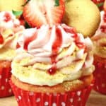 A Strawberry cupcake, fresh strawberries and a delicious cheesecake filling pair to make these delicious Strawberry Cheesecake Cupcakes. This strawberry cheesecake cupcake recipe is a real winner.